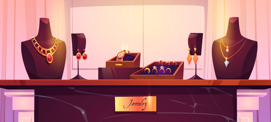 jewelry shop display with gold necklaces, rings